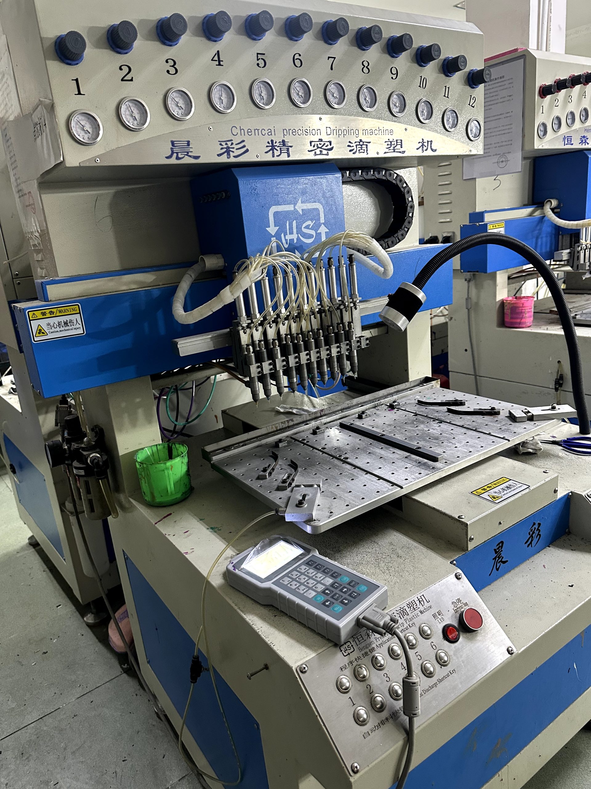 Multi-nozzle precision silicone dispensing machine for detailed custom silicone products