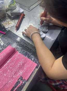 Manual color application during sample making